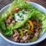 Philly Cheesesteak Lettuce Wraps – Easy Low-Carb Recipe 5 Philly Cheesesteak Lettuce Wraps with melted provolone and steak